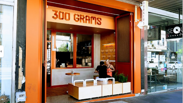 The orange exterior fit-out of 300 Grams in Northcote.