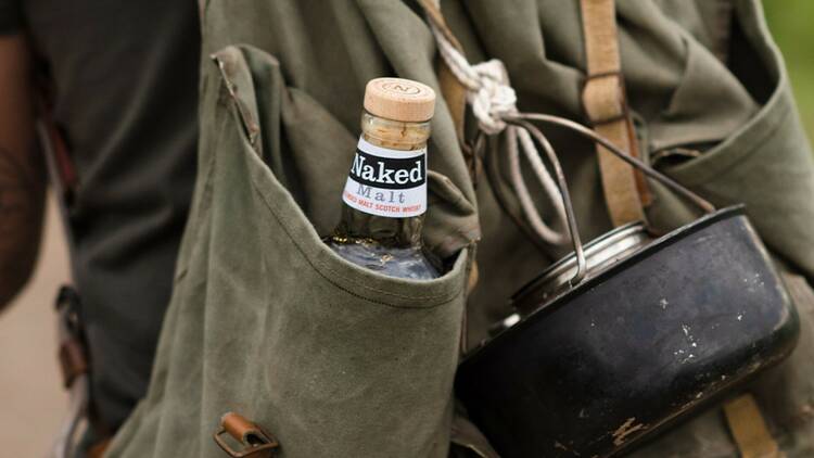 Naked Malt Whisky in a traveller's backpack