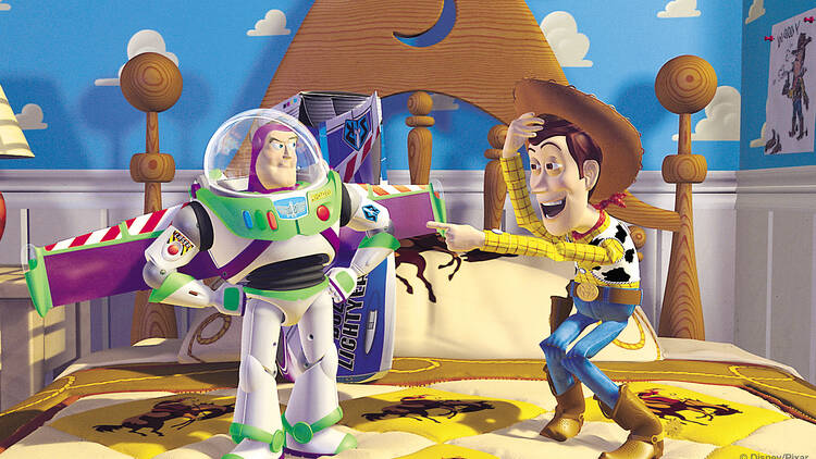 Buzz Lightyear and Woody on Andy's bed in Toy Story