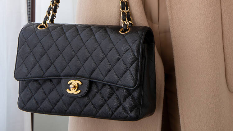 A black quilted Chanel bag.