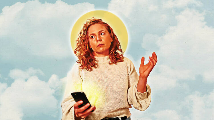 Comedian Bronwyn Kuss in front of a sky background with a halo.