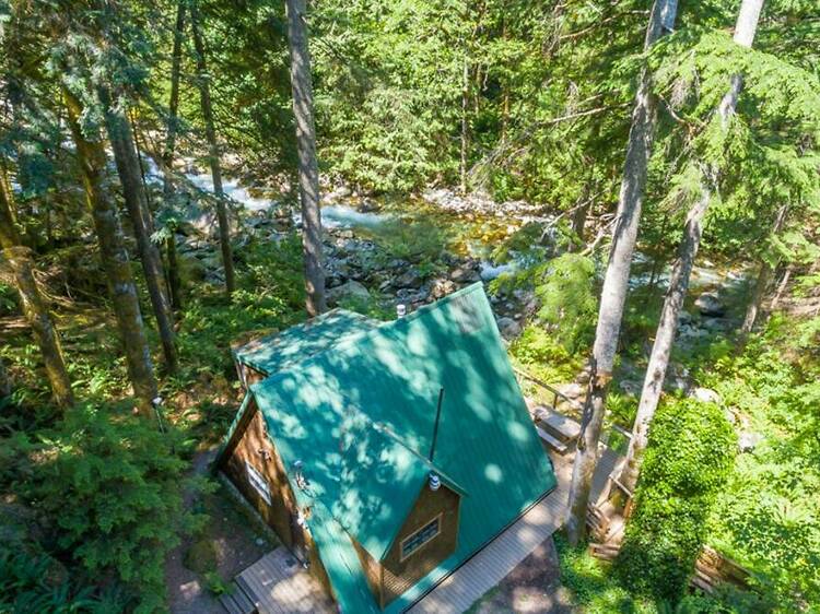 Secluded riverfront A-frame with hot tub
