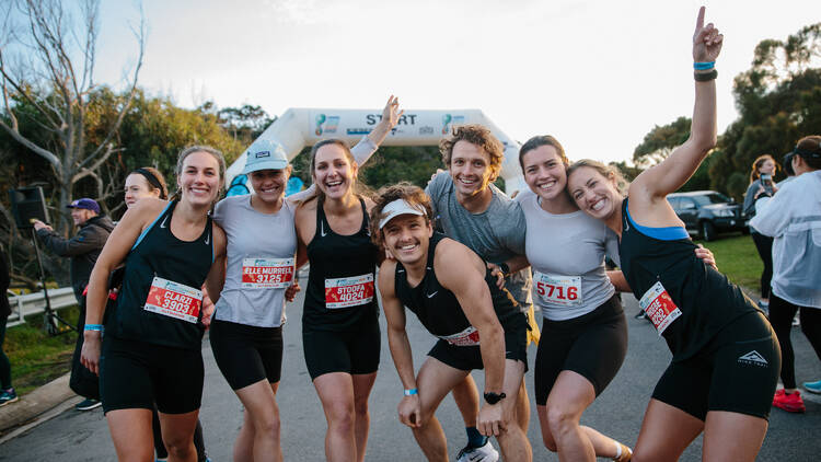 A group of people in running attire.