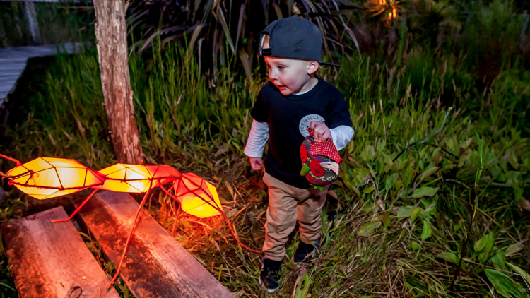 A child explores at Glow Festival