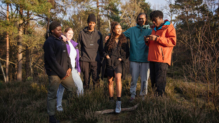 A group of young people in the woods