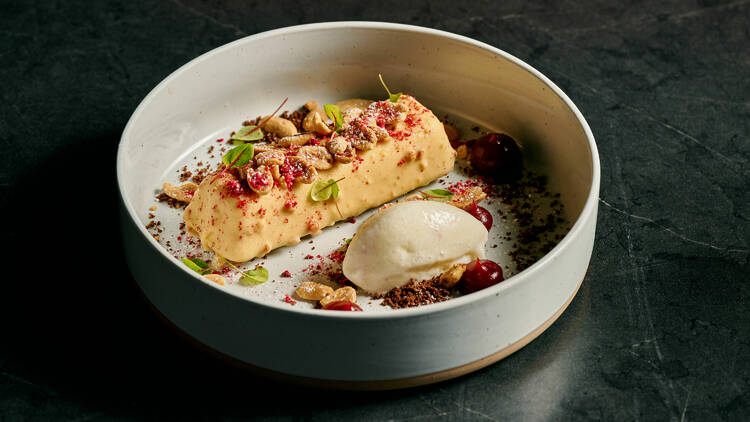 A Hamilton-inspired dish topped with peanuts and cranberry powder.