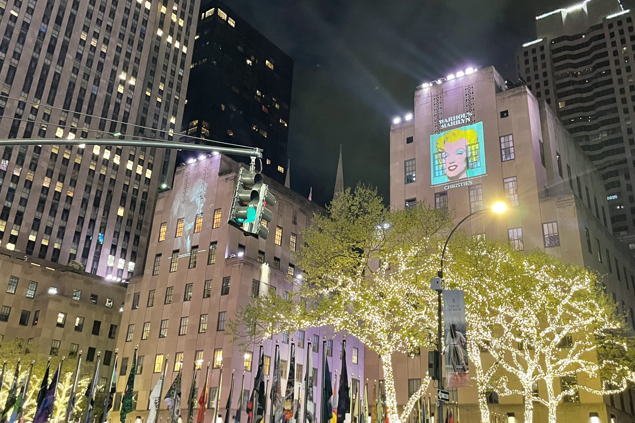 An iconic Andy Warhol painting is being projected onto 30 Rock