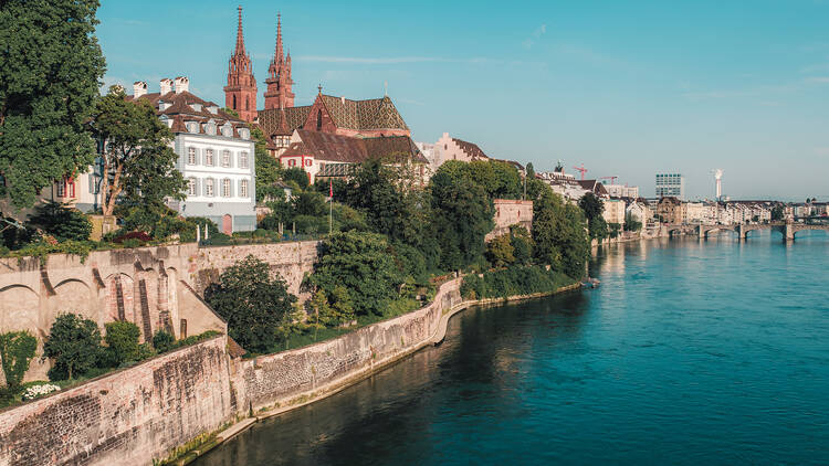 Historic buildings in Basel on the bank of the Rhine River.