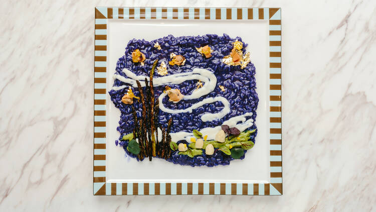 Risotto by Vincent Van Gogh, a blue-hued risotto with asparagus and mussels inspired by the Dutch artist's 1889 masterpiece The Starry Night