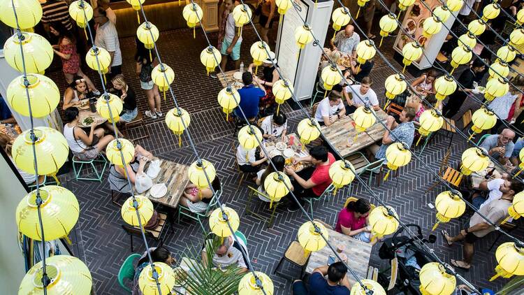 An aerial view of seated diners through lanterns at Spice Alley, Sydney