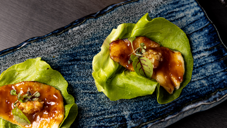 Toothfish on butter lettuce leaf