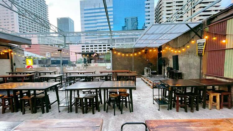 Enjoy drinks at a hidden rooftop bar