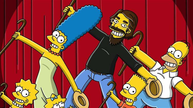 The members of the Simpsons family holding canes and dancing on stage.