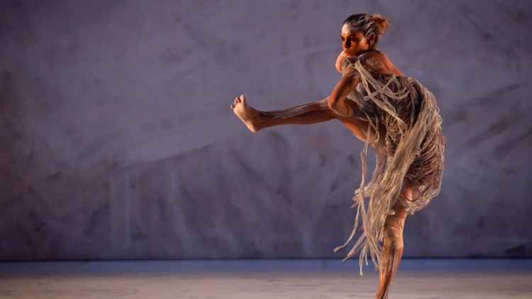 Dancer Lillian Banks wears a stringy white dress as she performs in Bangarra's Terrain