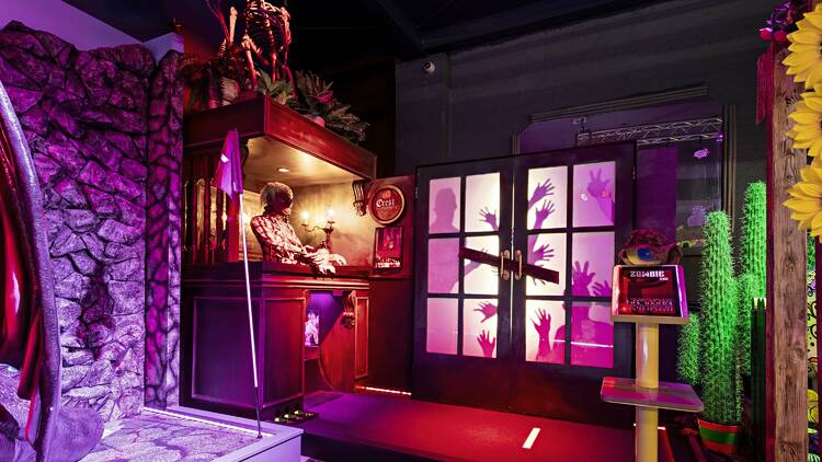 A mini golf course that's Halloween-themed.