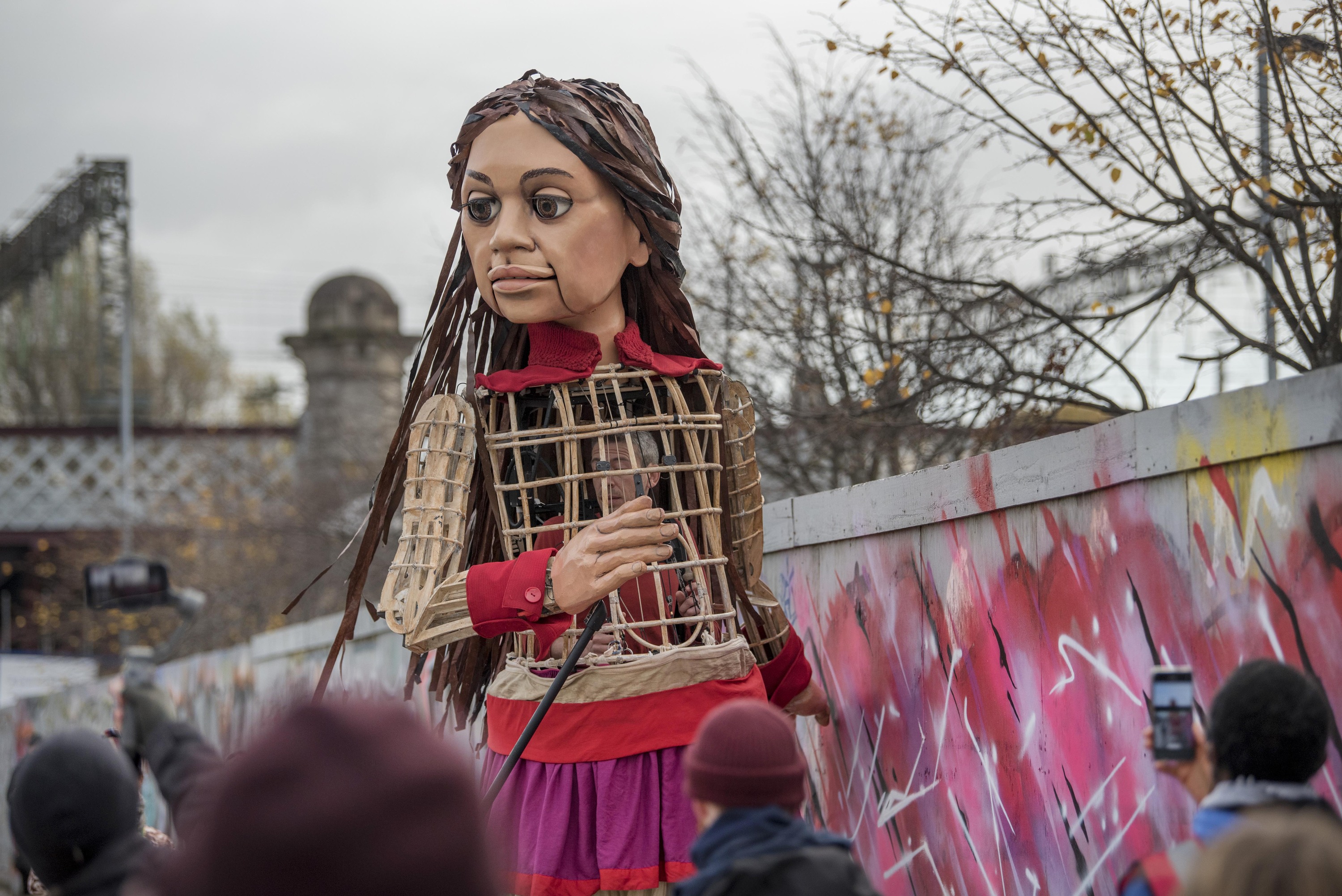 This giant puppet of a refugee girl is coming to NYC this fall