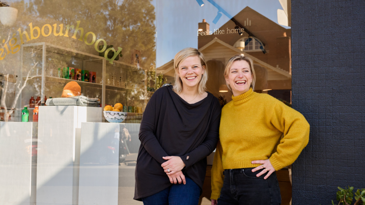 Co-owners Airlie Welch and Claire Bi pose outside their shop