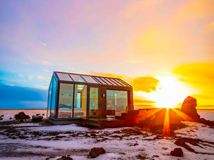 A cottage made of glass