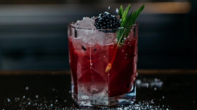 A berry cocktail with crushed ice and salt