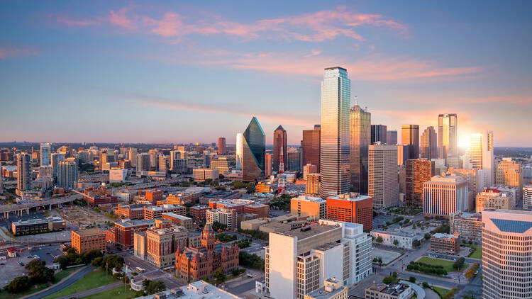 Dallas,,Texas,Cityscape,With,Blue,Sky,At,Sunset,,Texas