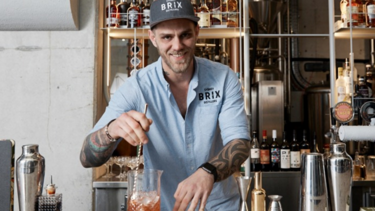 Bartender mixing a cocktail at Brix