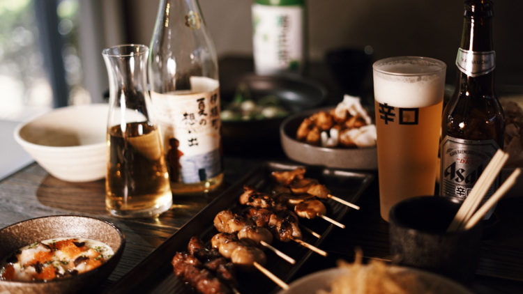 Yakitori and beers on a table