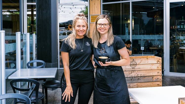 Two staff outside Nest Café in Adelaide