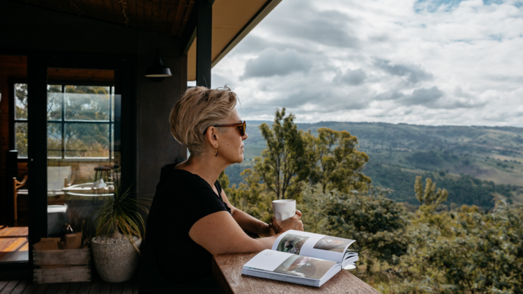 Woman looking across the valley