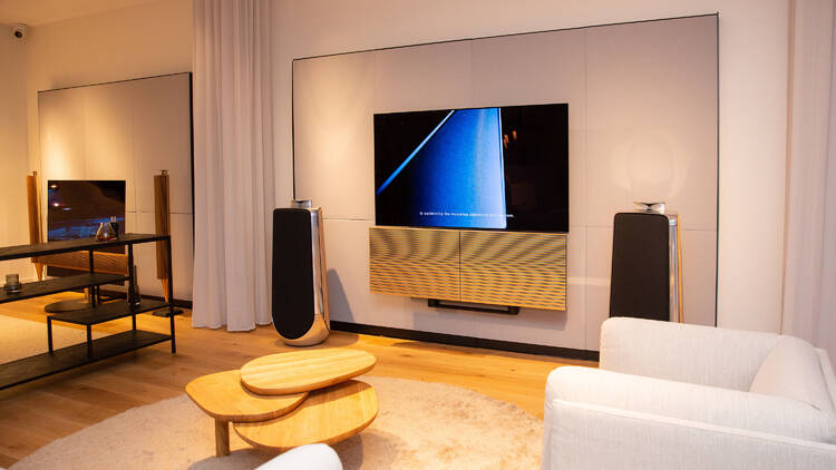 A furnished showroom with audio systems.