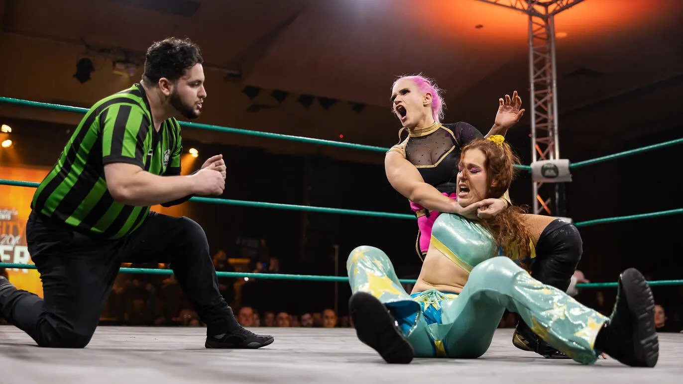 Shazza McKenzie immobilizes an opponent in at a Pro Wrestling Australia match