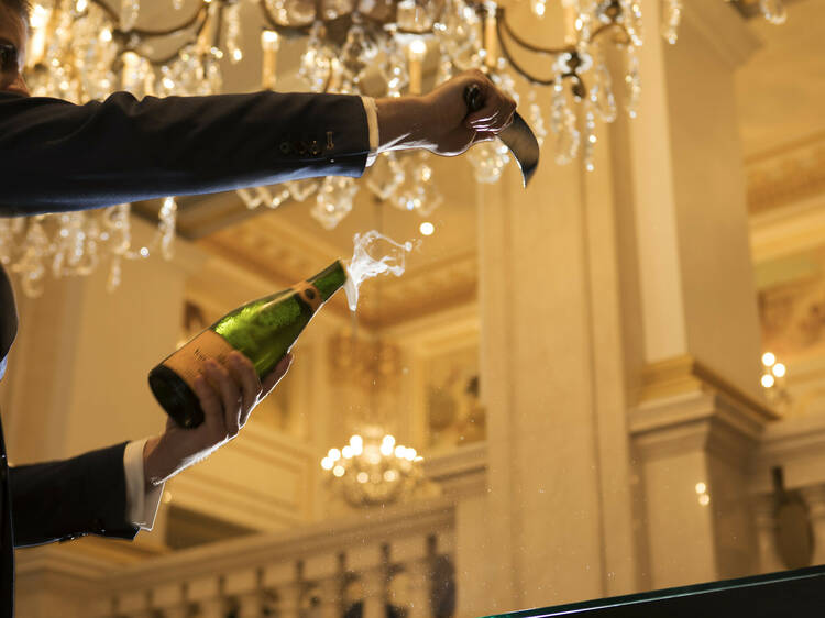 Learn sabrage and show bubbly who’s boss at this luxe NYC hotel’s new class