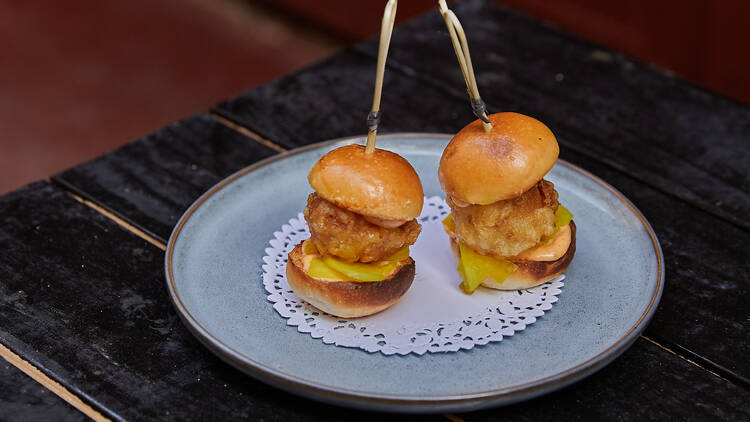 Two McScallops on a ceramic dish.