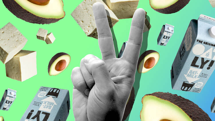 A hand swearing at Oatly milk cartons, avocados and blocks of tofu