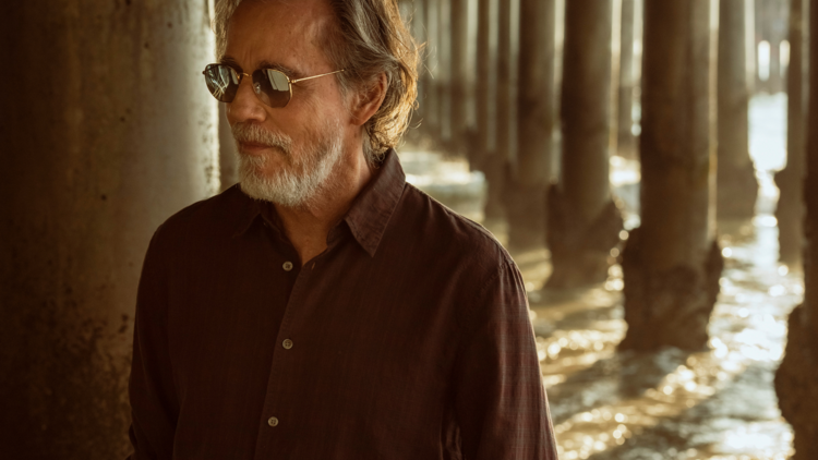 Jackson Browne under a boardwalk