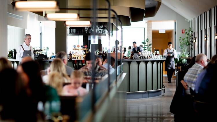 A bustling restaurant and bar interior