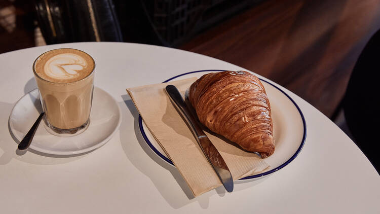 Austro Bakery coffee and croissant