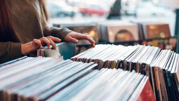 Women flipping through records