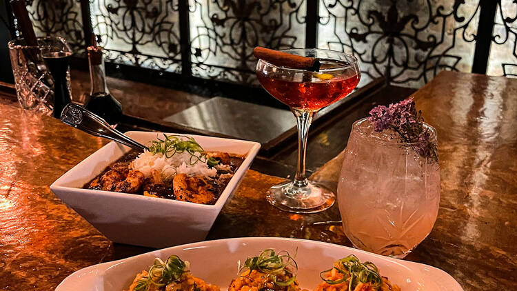 Boudin balls, seafood gumbo and cocktails served at Storyville