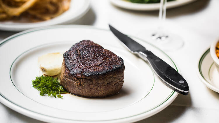 Filet mignon on a plate.