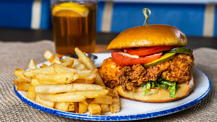 A fried chicken sandwich and fries.