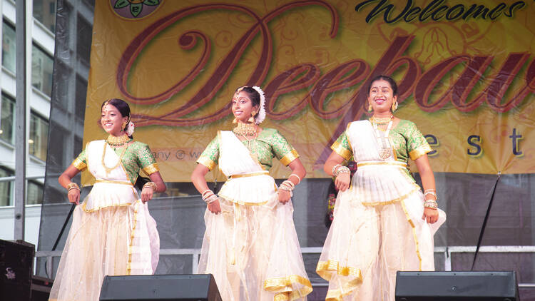 Dancers wearing saris at Deepavali 