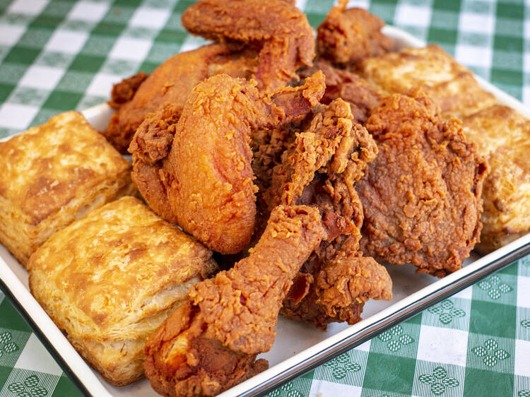 A platter of fried chicken and biscuits.