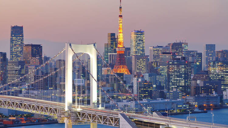 Tokyo city skyline with Rainbow Bridge and Tokyo Tower