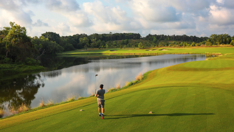 Have a game of golf at Els Golf Club Desaru Coast