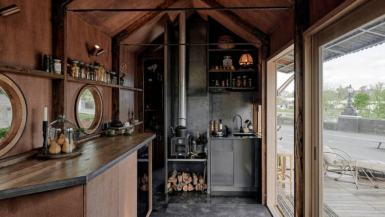 The kitchenette within a tiny, portable pop-up home.