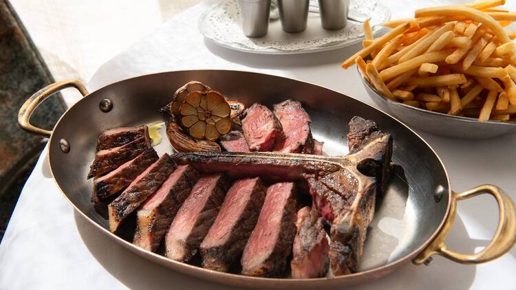 Slice T bone steak and chips