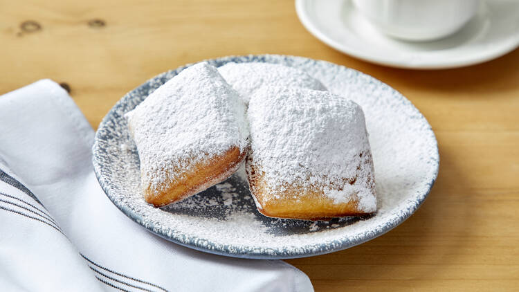 A plate of beignets.