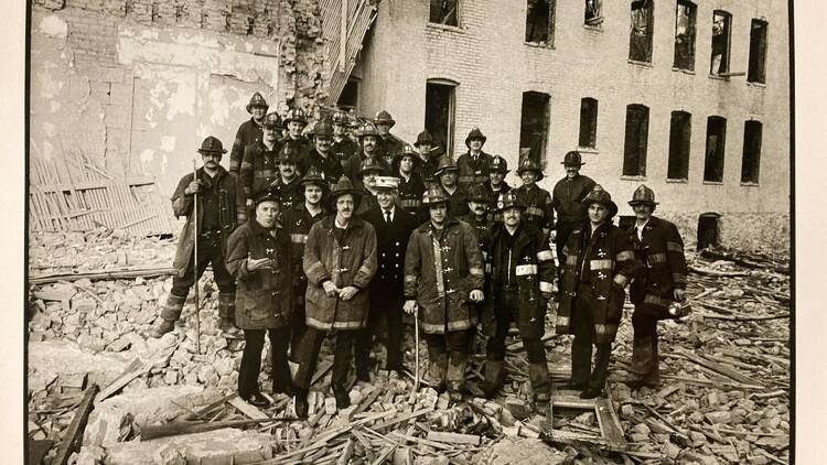 Firefighters stand together for a portrait.