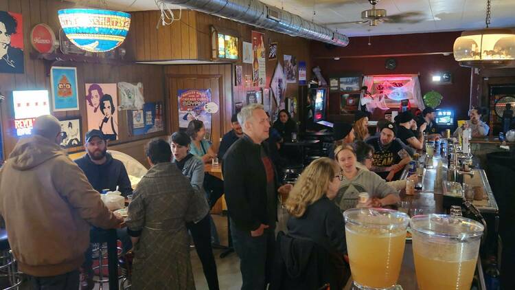 A crowd of people inside Reed's Local.