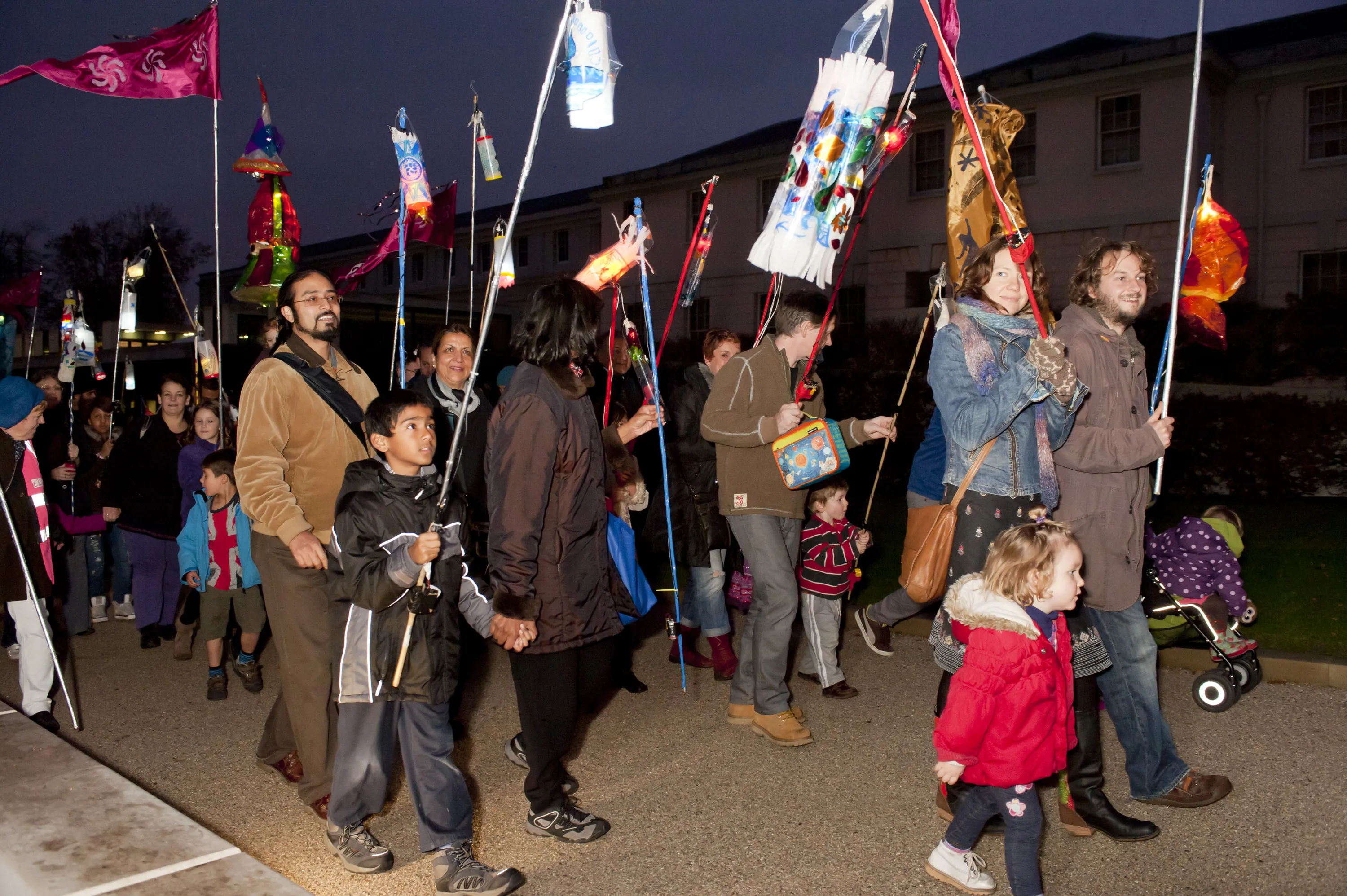 Children and guardians parade homemade Diwali lanterns through the grounds of the National Maritime Museums